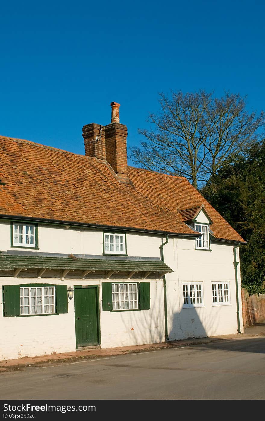 English country cottage village green shutters doors