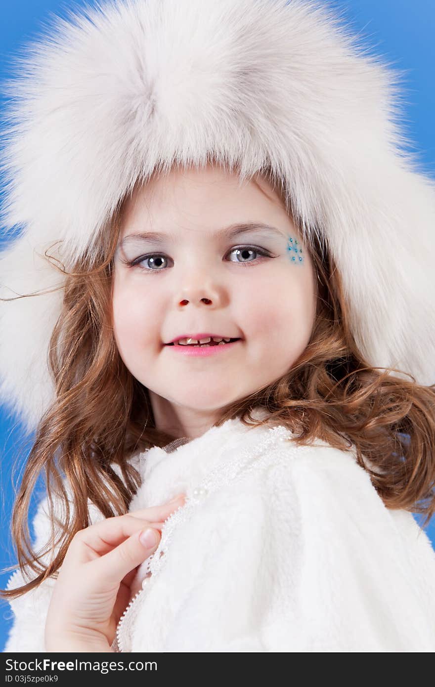 Beautiful girl in white cap, smiling