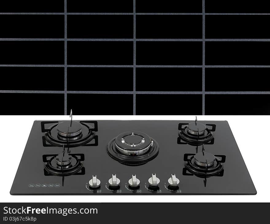 A  kitchen cooktop on a kitchen bench. A  kitchen cooktop on a kitchen bench