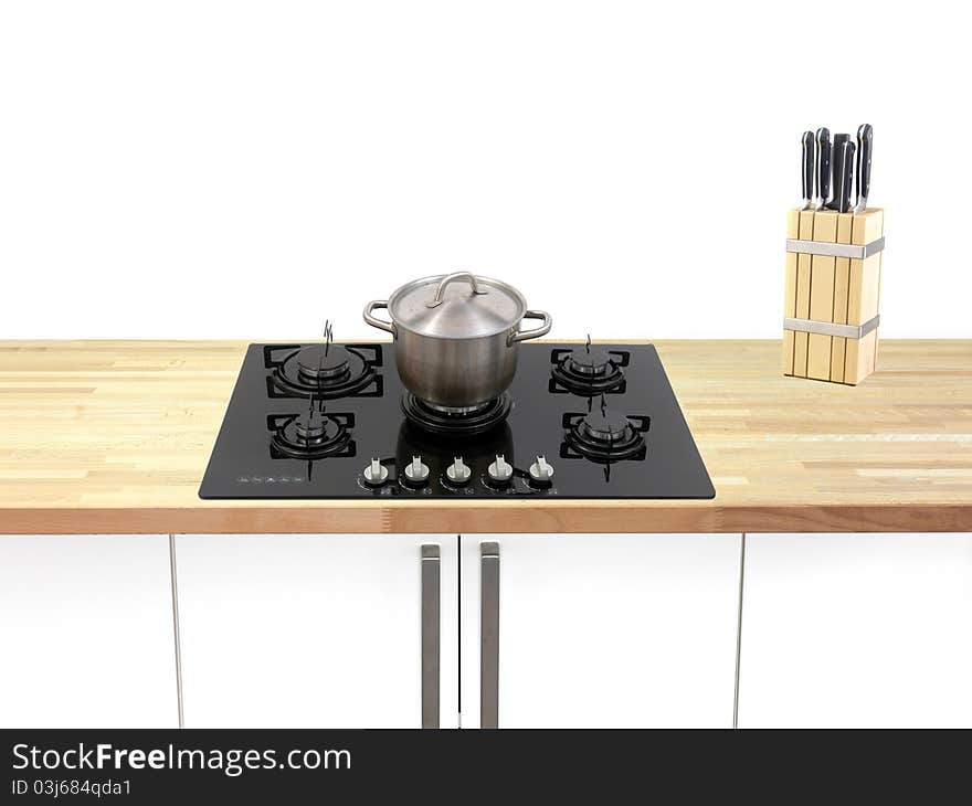 A  kitchen cooktop on a kitchen bench. A  kitchen cooktop on a kitchen bench