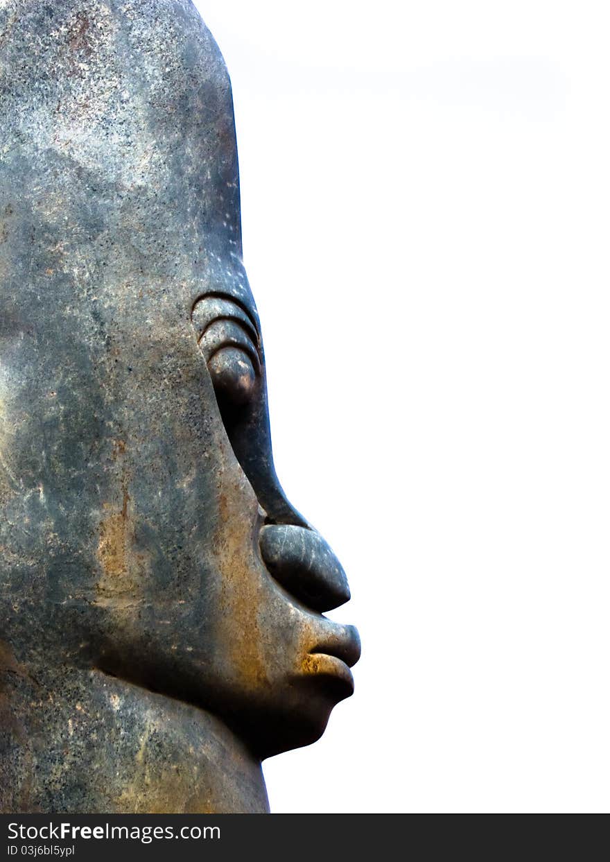 Tribal mask statue isolated against a white background. Tribal mask statue isolated against a white background.