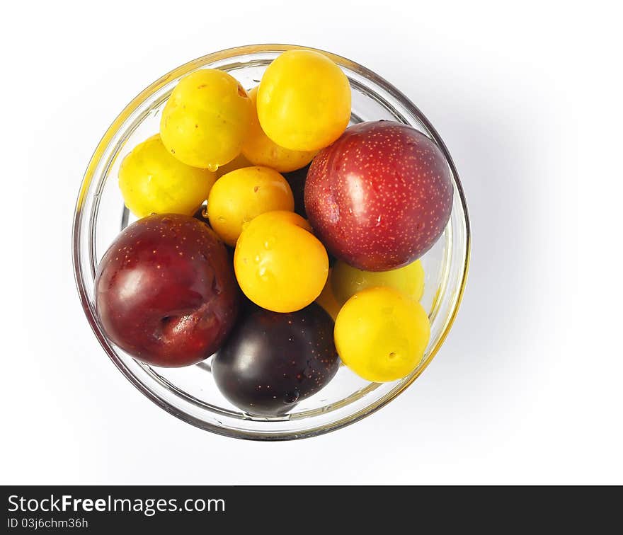 A mixture of fresh prunes of different colors, size and taste. A mixture of fresh prunes of different colors, size and taste