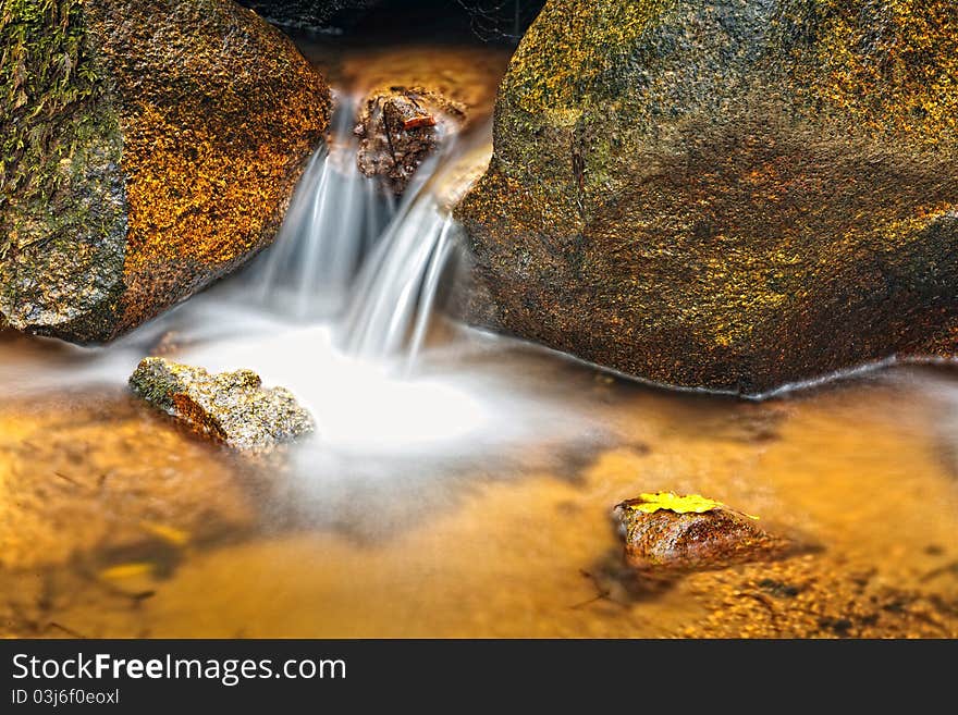 Small natural waterfall in the National Park Sintra-Cascais. Small natural waterfall in the National Park Sintra-Cascais.