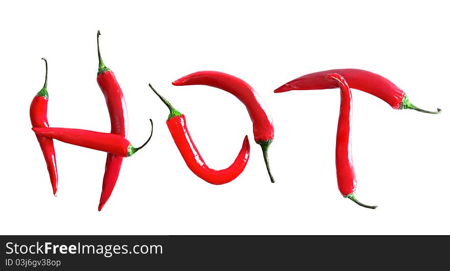 Red chilli peppers in word hot on white. Red chilli peppers in word hot on white