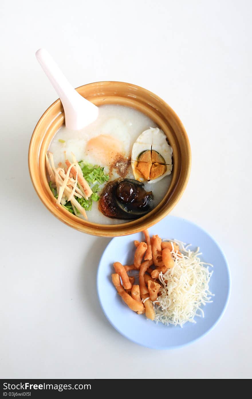 Gruel and salted egg /Preserved egg