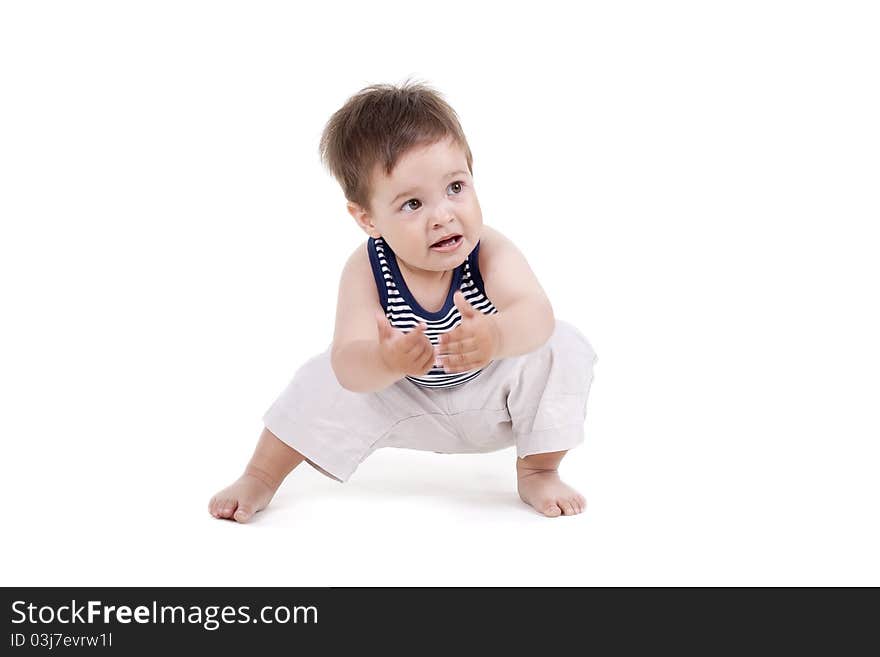 Small cute boy is happy on a white background. Small cute boy is happy on a white background