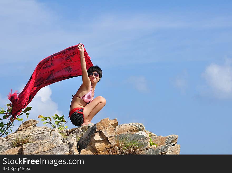 Asian woman on stone for background