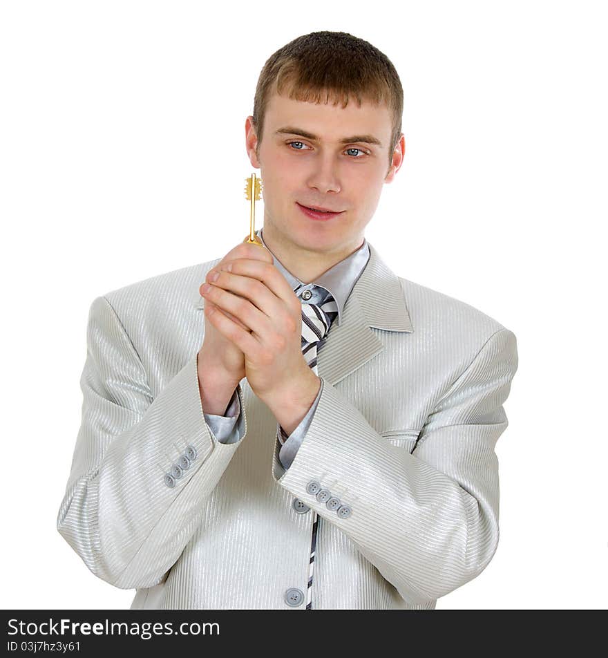 Businessman holding the key to success.