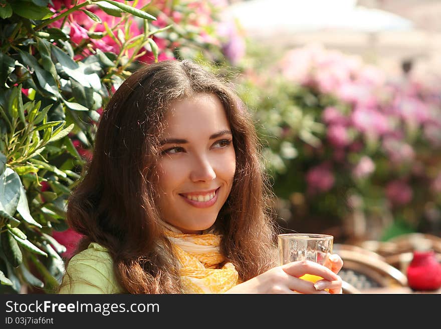 Attractive young woman relaxing in cafe. Attractive young woman relaxing in cafe