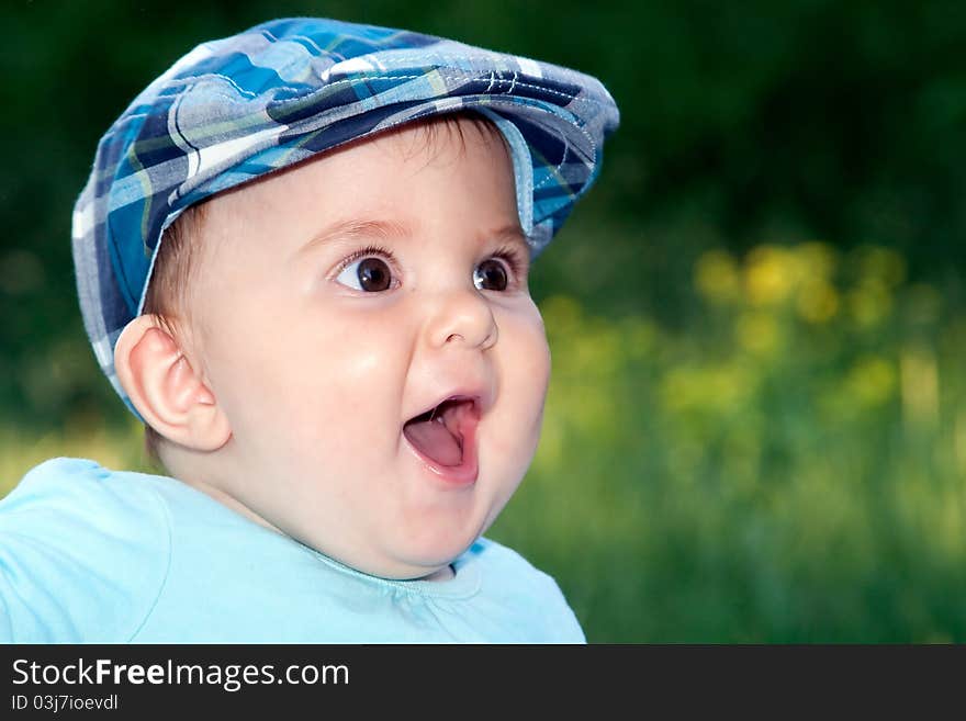 Cute little baby boy portrait outdoors