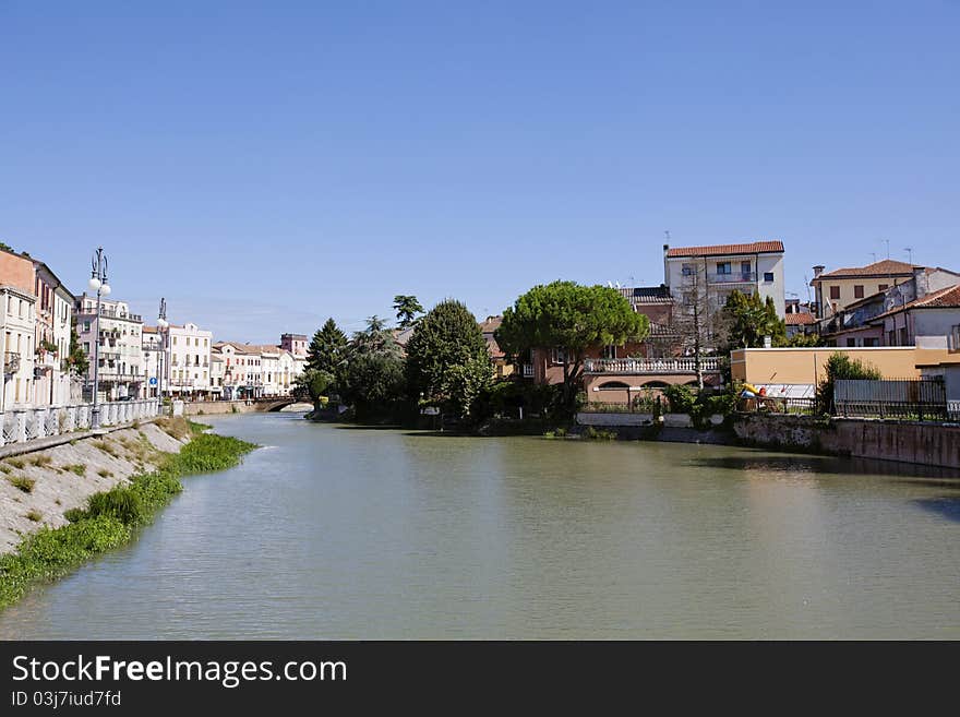 River and old buildings, Italy