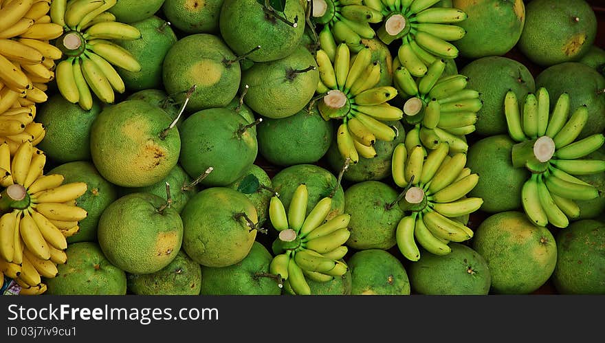 Bundle of fruites: bananas and limes. Bundle of fruites: bananas and limes