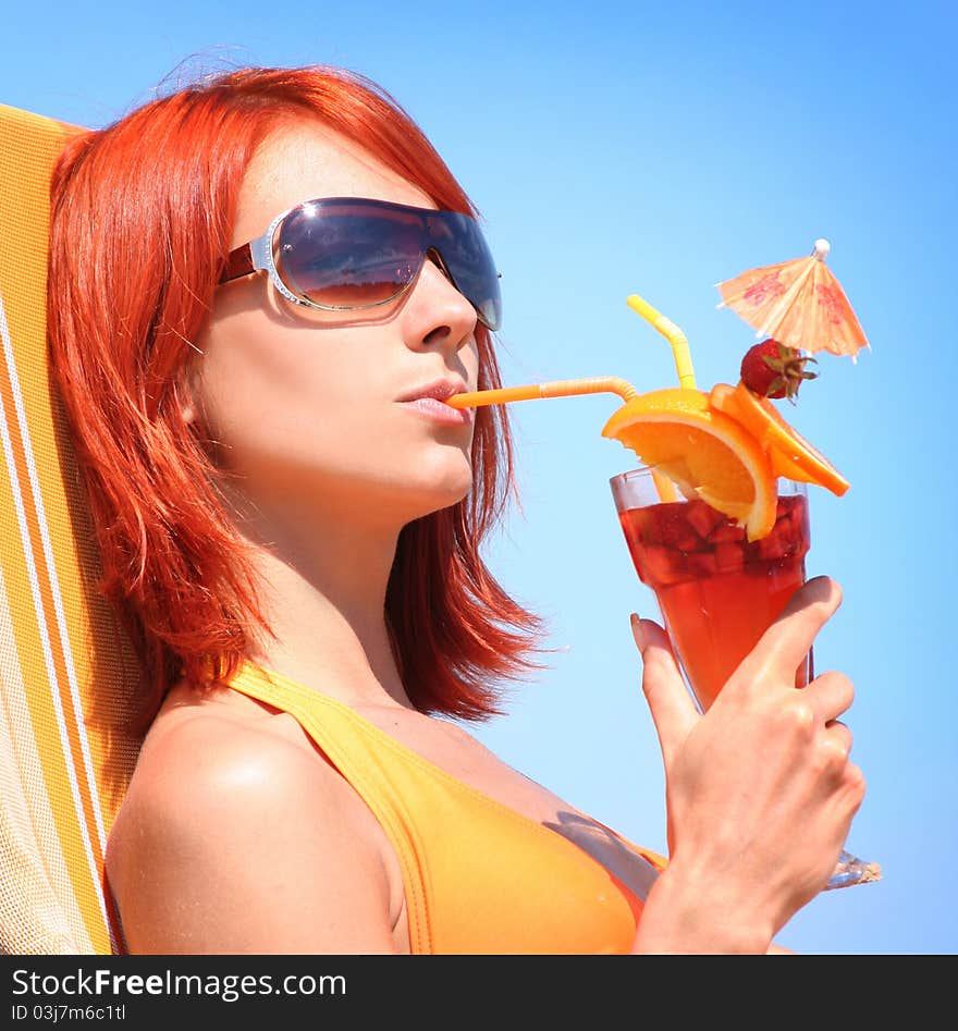 Young woman relaxing on beach. Young woman relaxing on beach