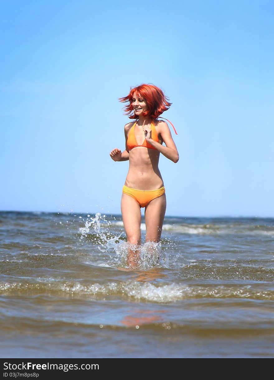 Young mother and son having fun on the beach. Young mother and son having fun on the beach