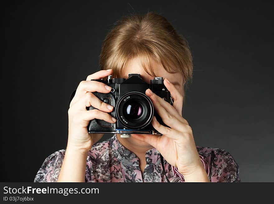 Portrait Of A Girl With A Camera