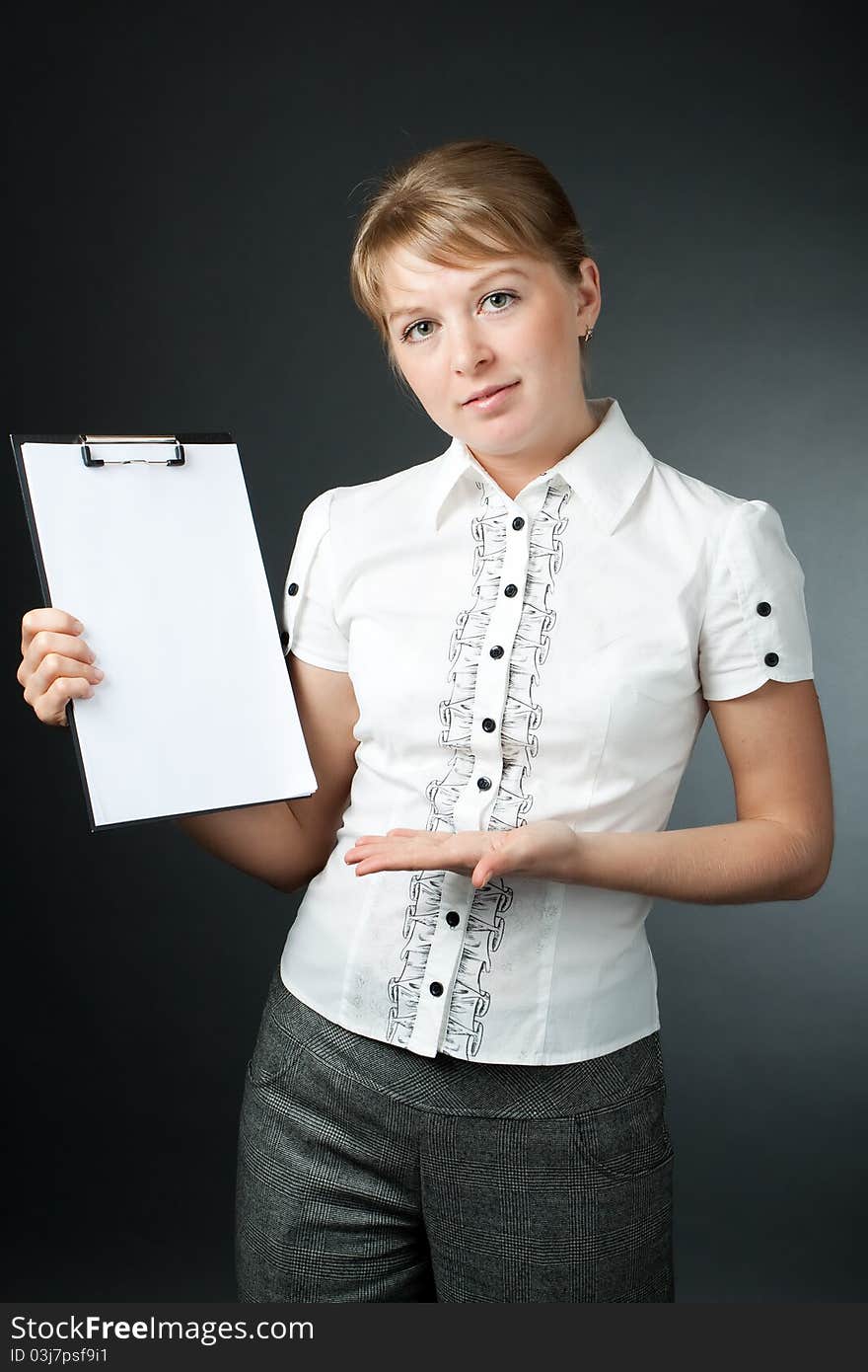 Smiling Blonde Girl With An Empty Plate