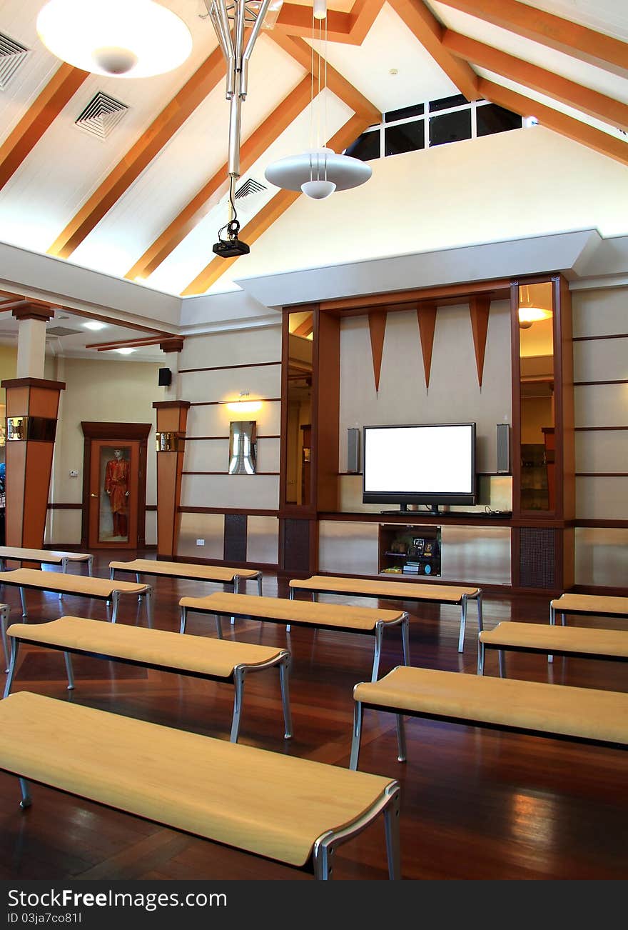 Interior of gallery main hall for presentation of displayed cultural items such as Malay ethnic wedding costumes and handicraft. An arrangement of bench also seen here for visitors. Interior of gallery main hall for presentation of displayed cultural items such as Malay ethnic wedding costumes and handicraft. An arrangement of bench also seen here for visitors.