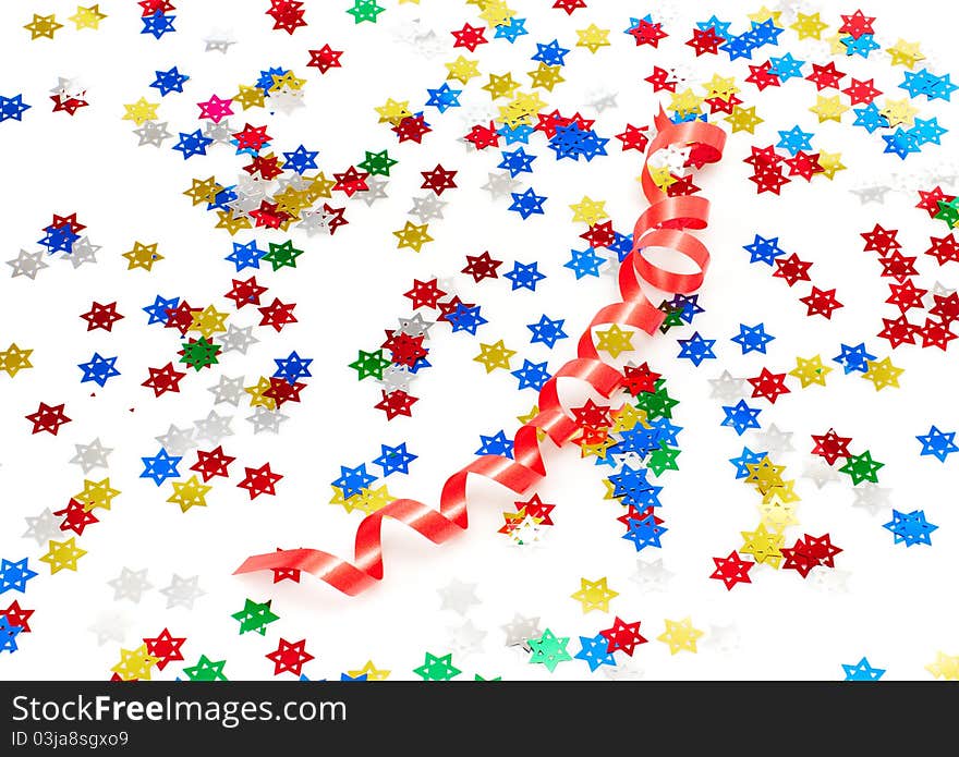 Red party decoration and confetti isolated on white background