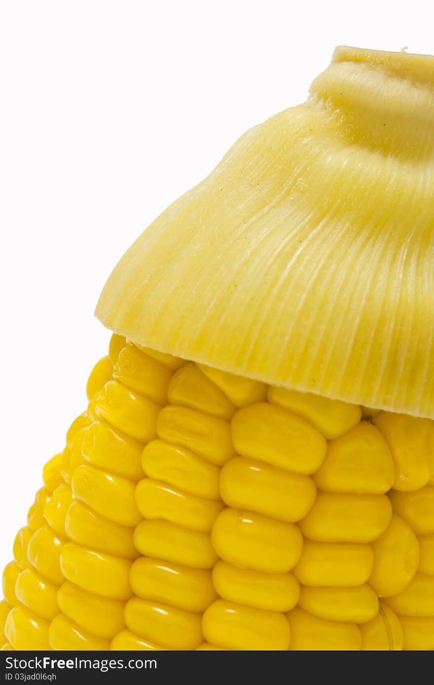 Yellow corn, cooked with white background.