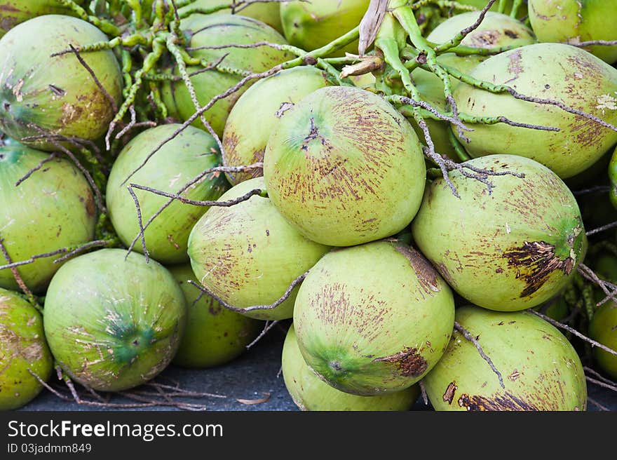 A group of green coconuts