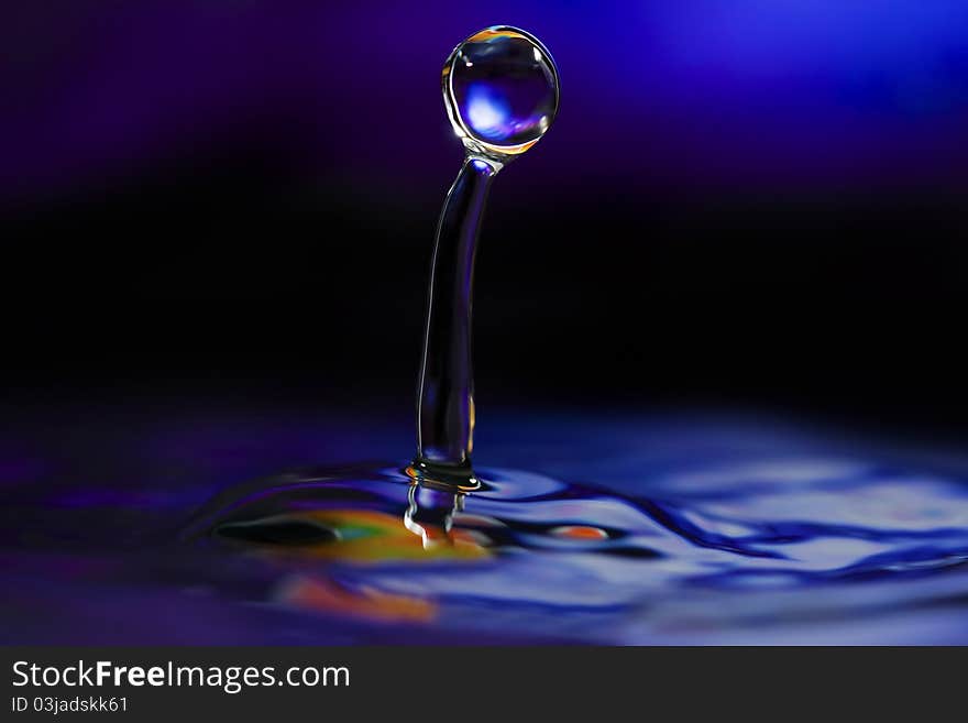 Close up of a Colorful Water Drop. Close up of a Colorful Water Drop.