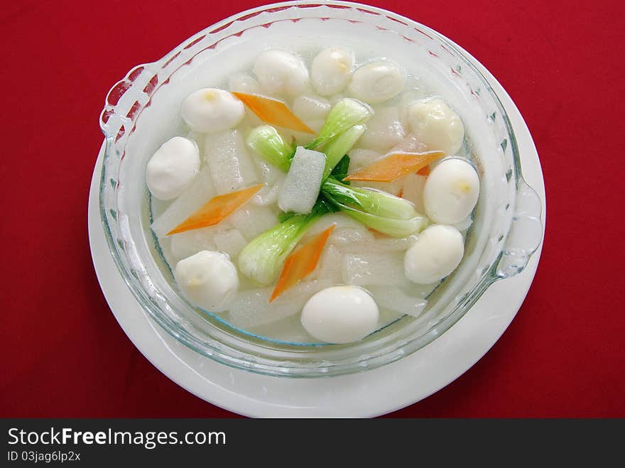 Seafood soup by shrimp, sea cucumber, fish balls etc.