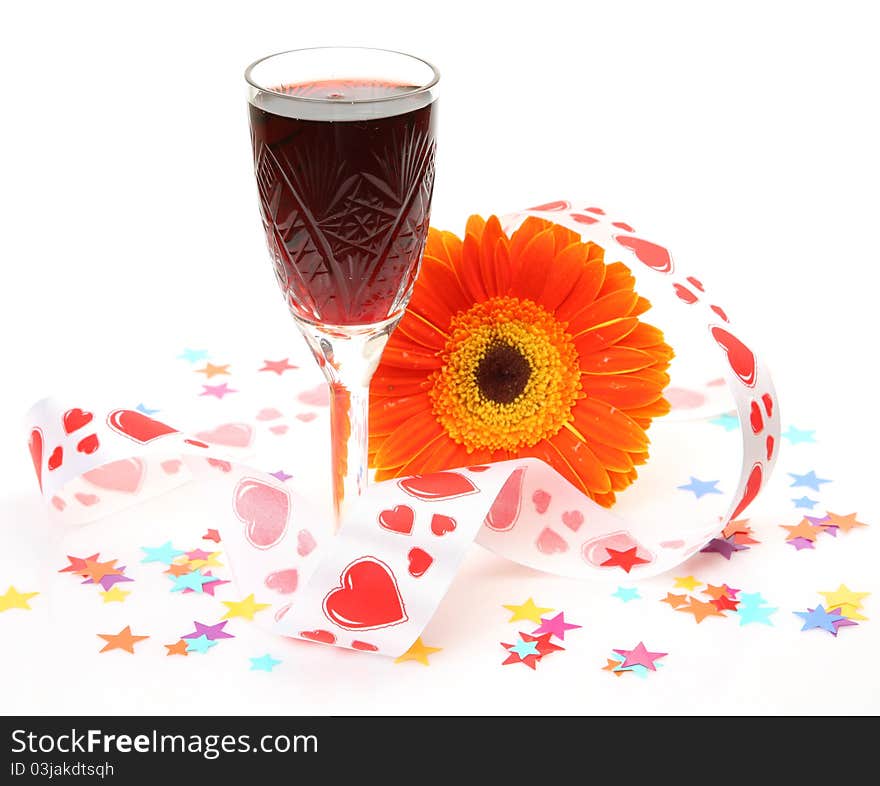 Wine and flower on a white background