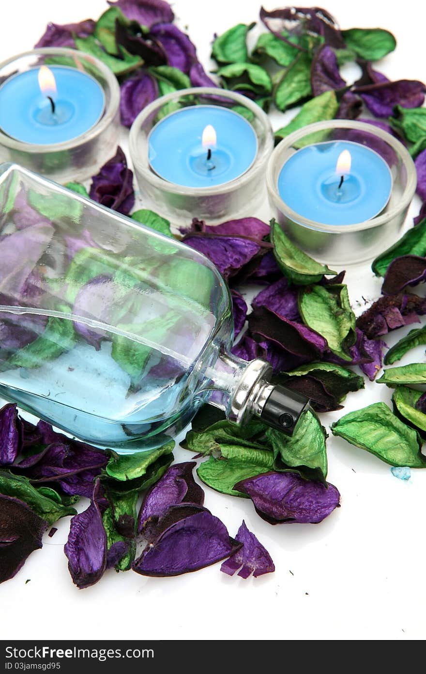 Flower and candles on a white background. Flower and candles on a white background