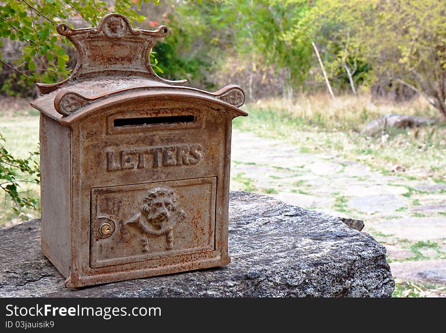 Ornate rusty mailbox in a jungle resort, India. Ornate rusty mailbox in a jungle resort, India.