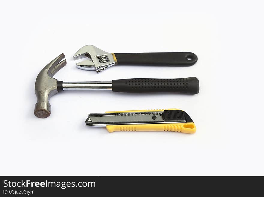 Wrench, hammer, cutter, on a white background. Wrench, hammer, cutter, on a white background.