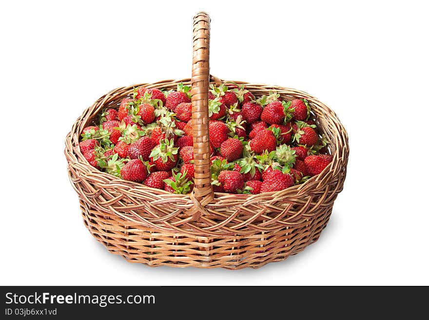 Full basket of ripe strawberries isolated on white background