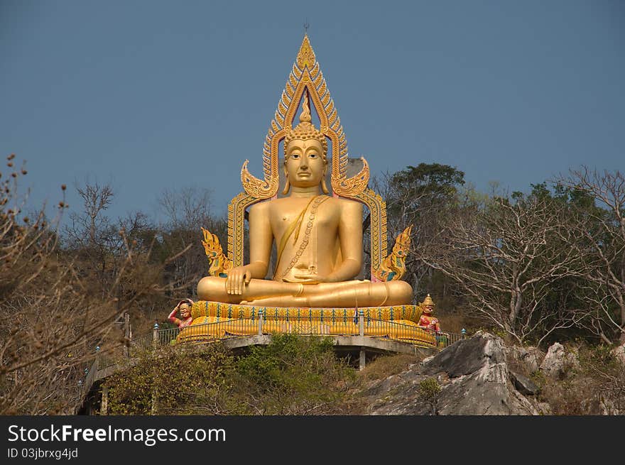 Image of buddha on mountain at Ratchaburi province Thailand