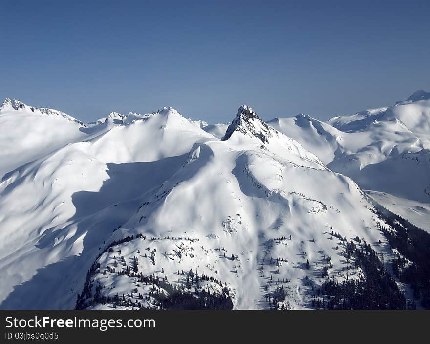 Coast Mountain and Mt. Helmet in winter. Coast Mountain and Mt. Helmet in winter