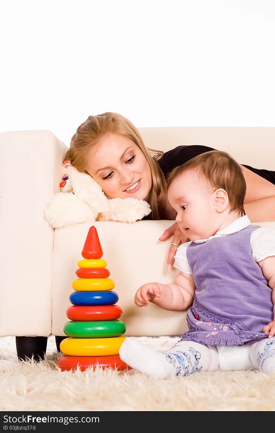 Portrait of a cute mom with her little daughter. Portrait of a cute mom with her little daughter