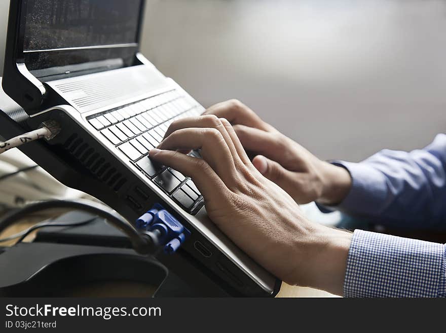 Businessman working on his laptop. Businessman working on his laptop