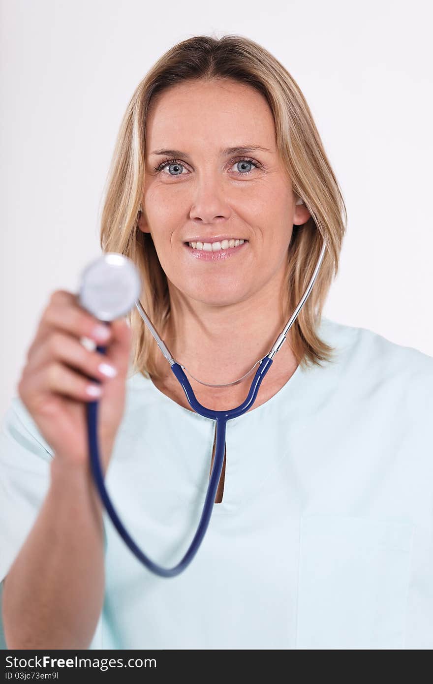 Blond woman doctor with stethoscope in hospital. Blond woman doctor with stethoscope in hospital