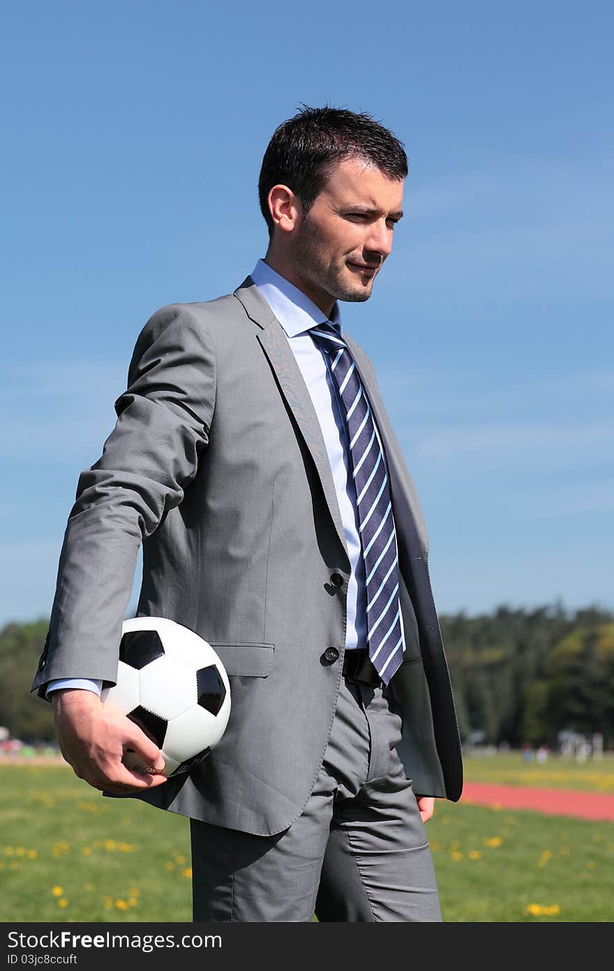 Coach with ball