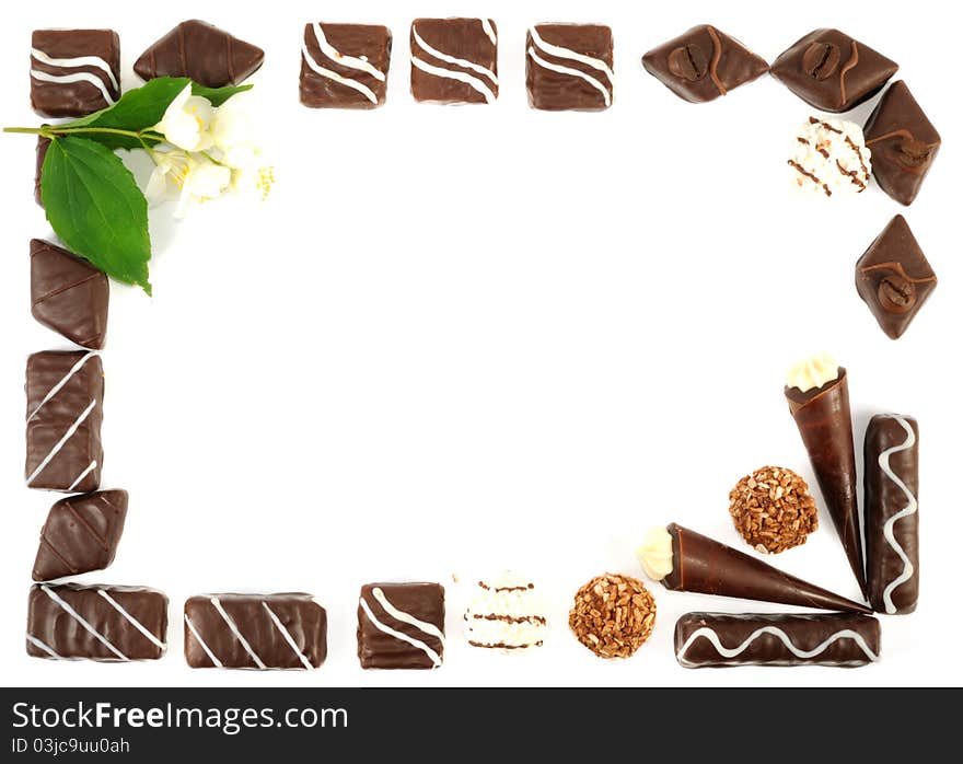 Fraime from Chocolate sweets, isolated on a white background. Fraime from Chocolate sweets, isolated on a white background