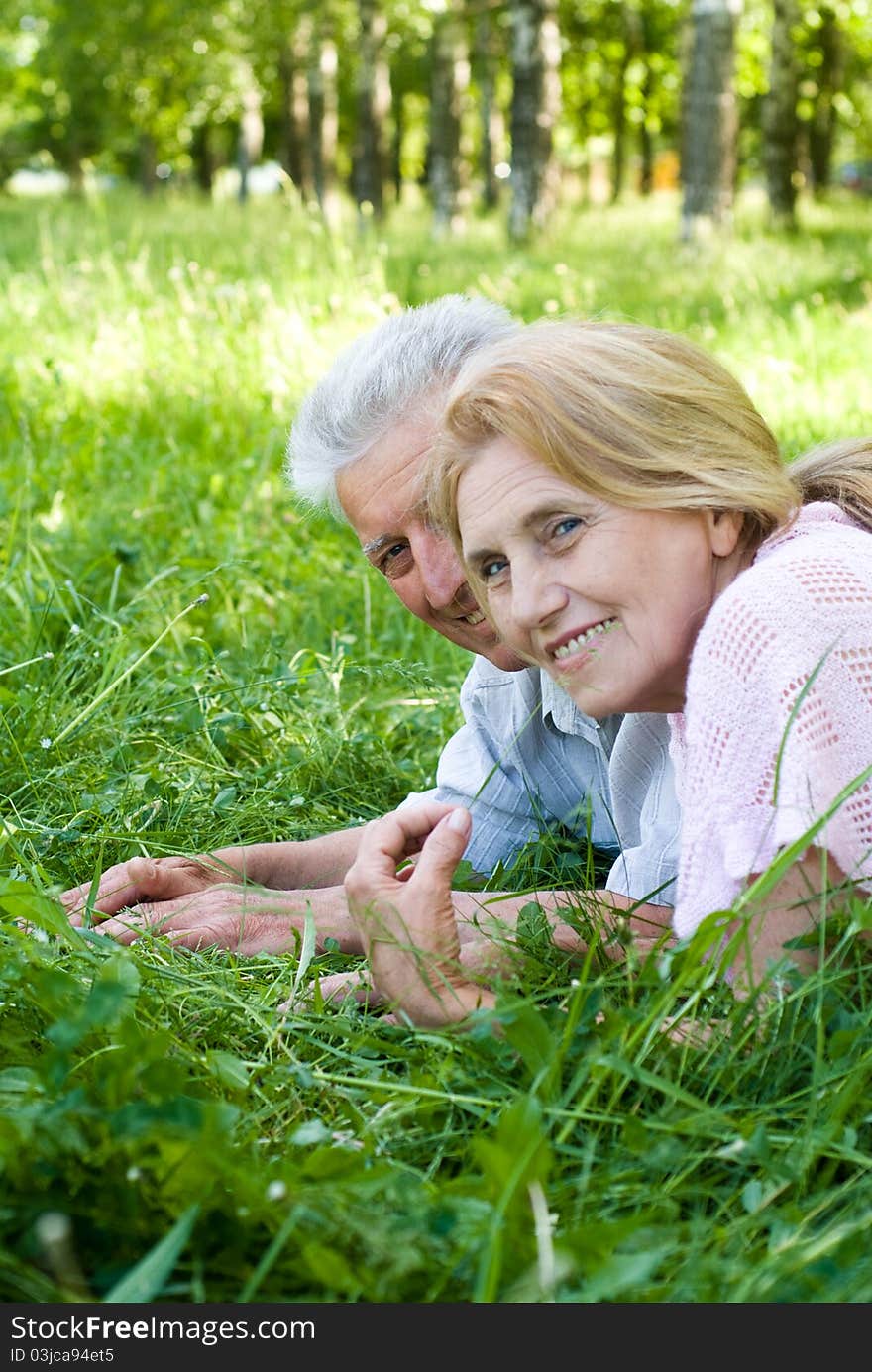 Portrait of a happy elderly couple at nature