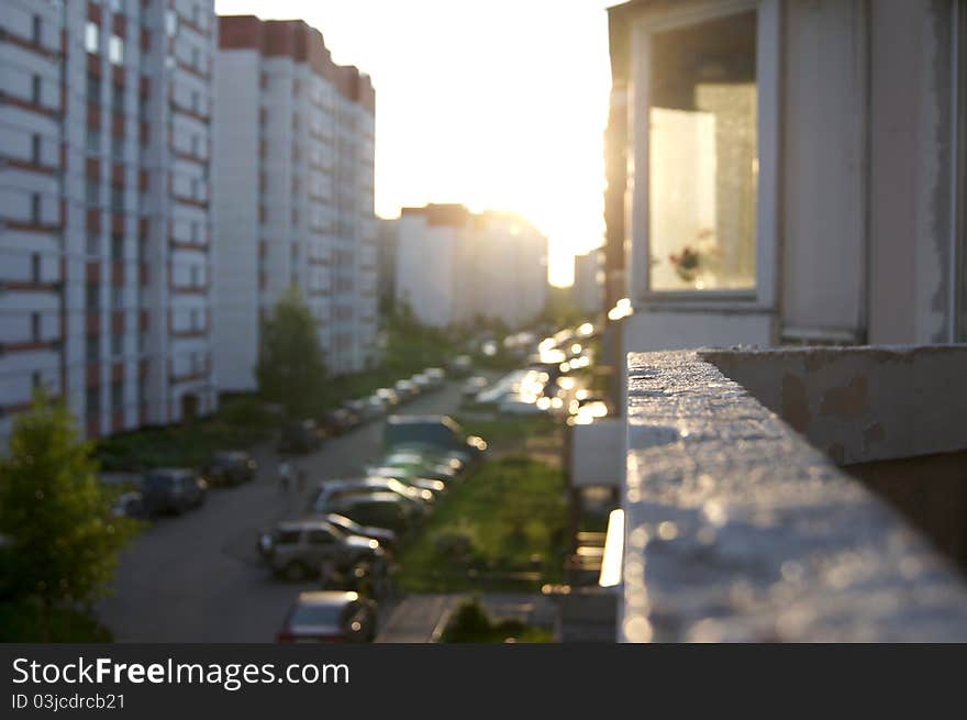 The first beams of the sun in a city. The first beams of the sun in a city