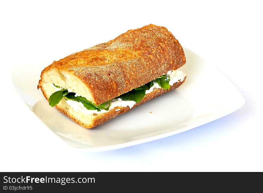 Labneh sandwich along with mint inside a whole wheat baguette, suits vegetarians. Labneh sandwich along with mint inside a whole wheat baguette, suits vegetarians