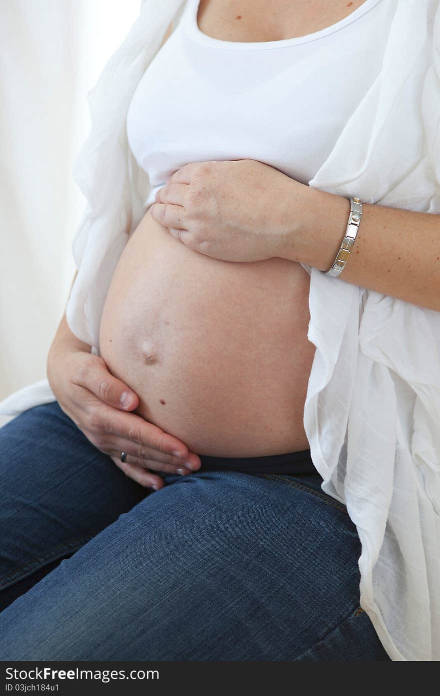 Shot of a pregnant woman and her belly