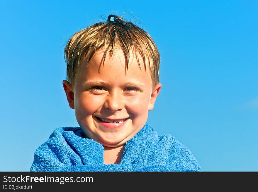 Portrait of cute boy at the beach