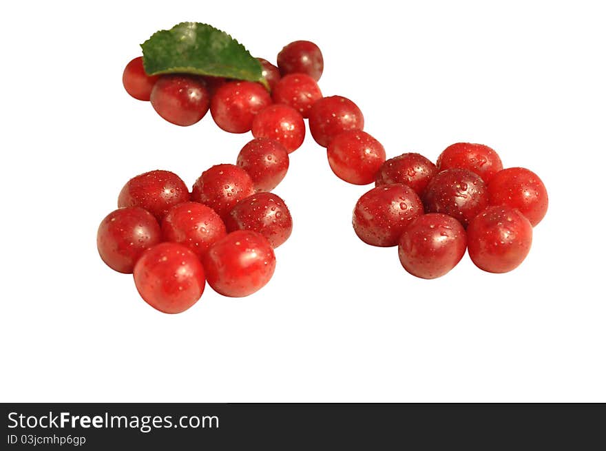 Fresh red cherries with leaf isolated on white. Fresh red cherries with leaf isolated on white