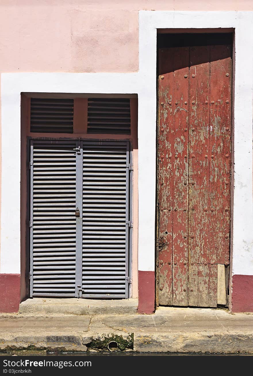 Wooden brown painted and metal doors. Wooden brown painted and metal doors