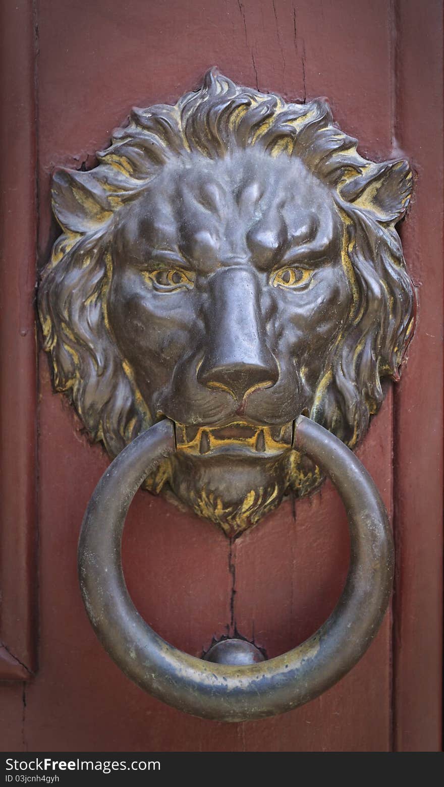 Brass Doorknocker In The Shape Of Ferocious Lion