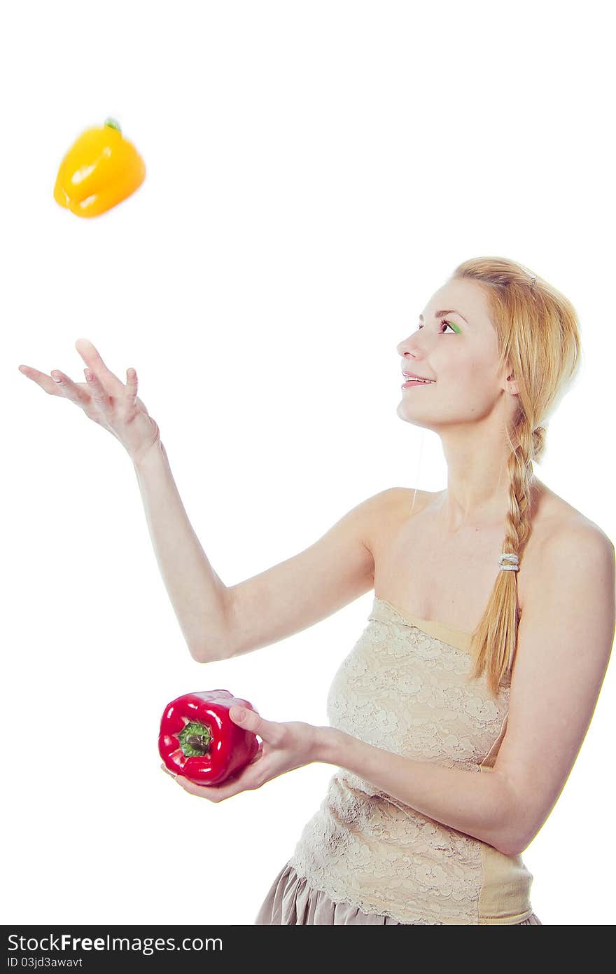 Woman with yellow and red peppers