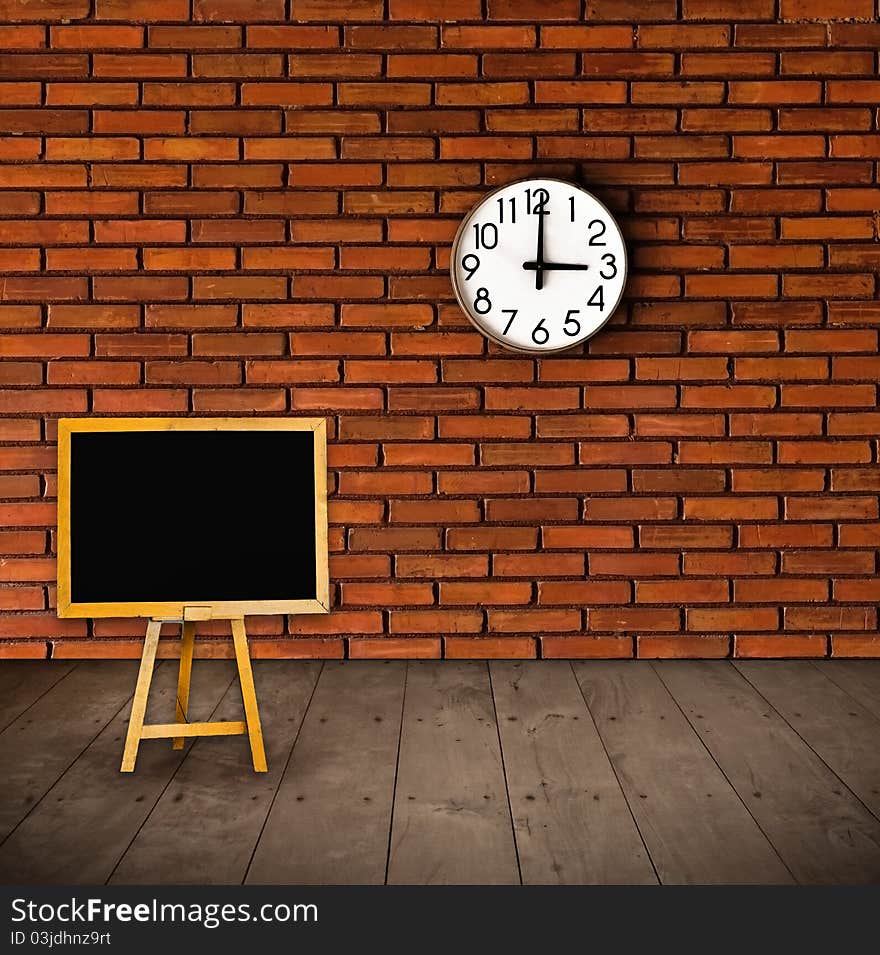 Black board and clock on the wall. Black board and clock on the wall