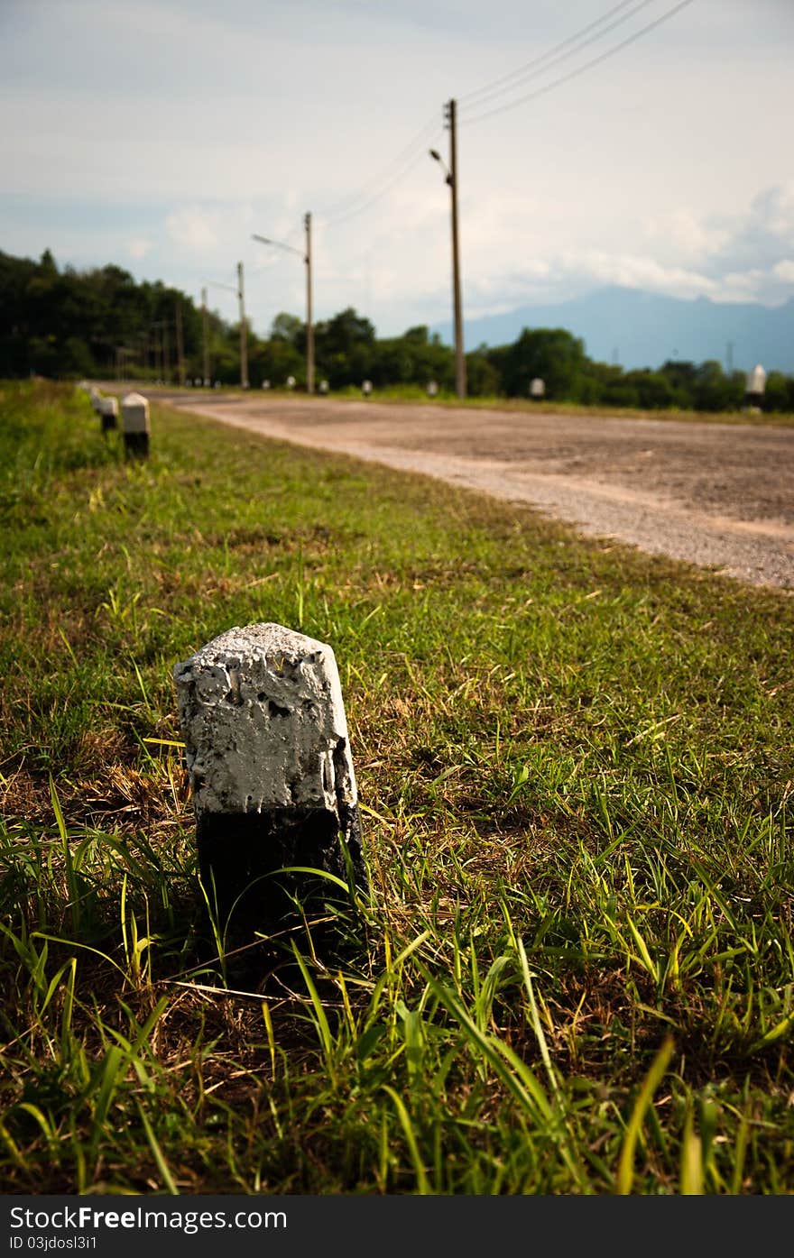 Kilometer stones on the road