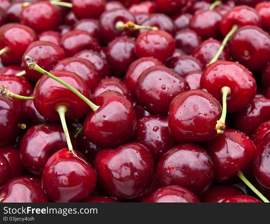 This is a sweet red cherry background. This is a sweet red cherry background